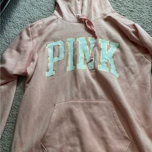 Pink Hoodie with White Lettering